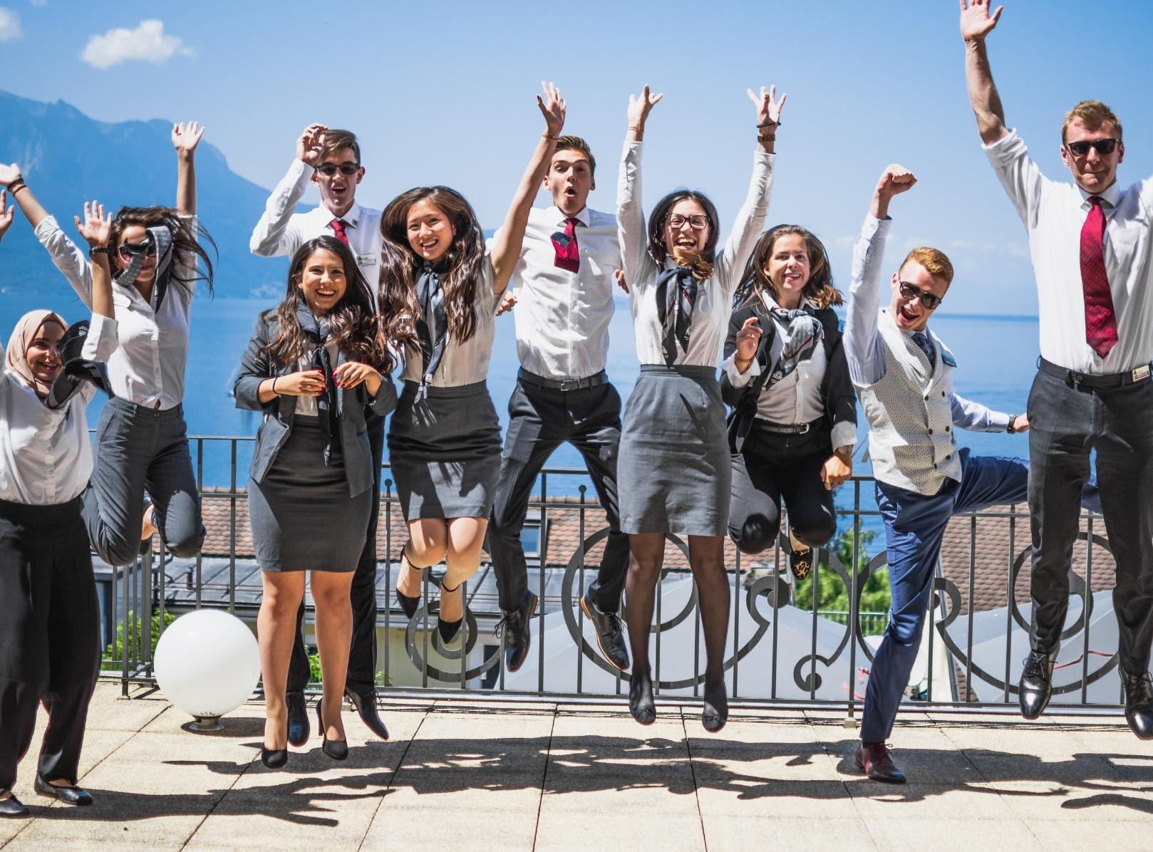 Students on the terrasse of HIM's campus